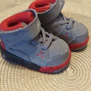 Nike Air Jordan Gray and Red Sneakers with Dynamic Design